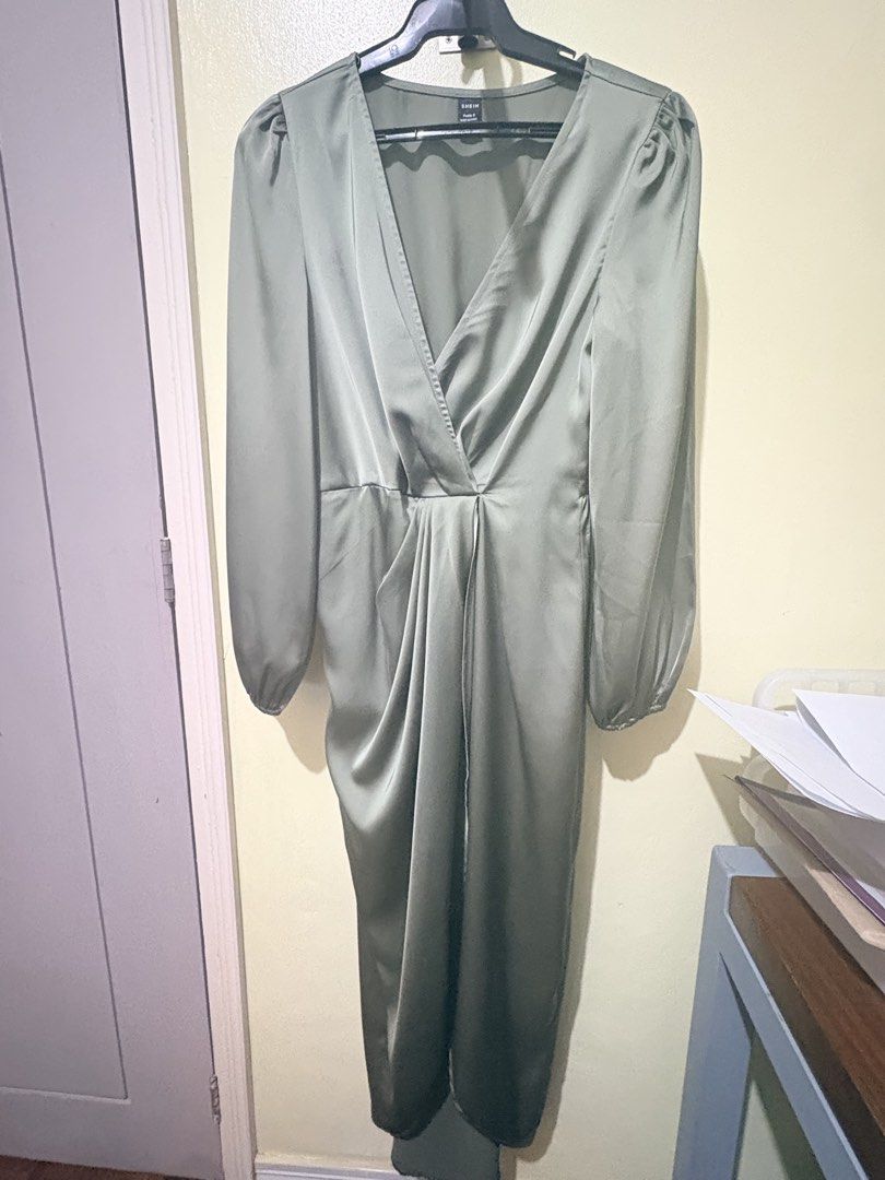 SHEIN Petite Satin Dress (Category: Dresses) located in Quezon City. Submitted by mikamdr (Listing ID 1432936266, Image 3). Description: Elegant satin dress from SHEIN Petite. Features a flattering V-neckline and long sleeves with a draped front design. The dress has a midi length with a slit. The color is a muted green. Perfect for special occasions or a night out. used once for a wedding negotiable.