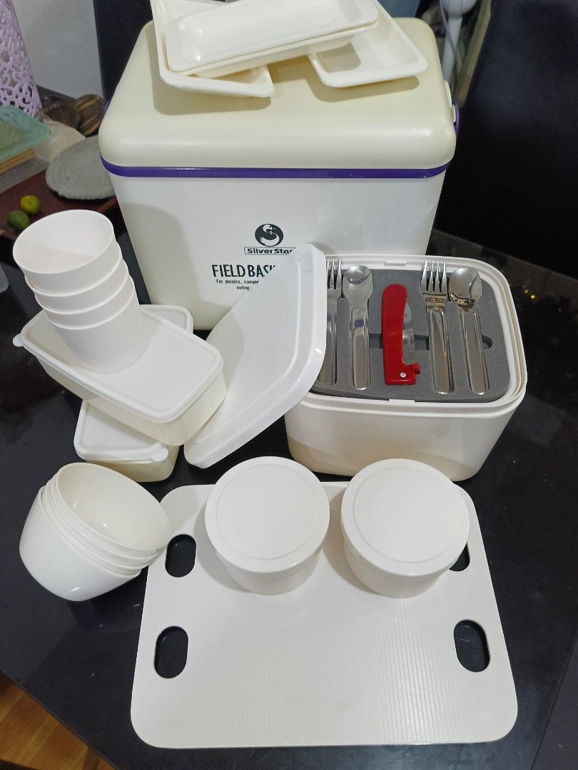 Silver Star Field Basket Picnic Set (Category: Food Organization & Storage) located in Quezon City. Submitted by 12thfd (Listing ID 1432851397, Image 1). Description: - Complete picnic set for outdoor gatherings. - Includes a cooler box with purple trim and handle. - Features plates, cups, cutlery (forks, spoons, bottle opener). - Comes with a serving tray and food storage containers. - Ideal for picnics and outdoor events..