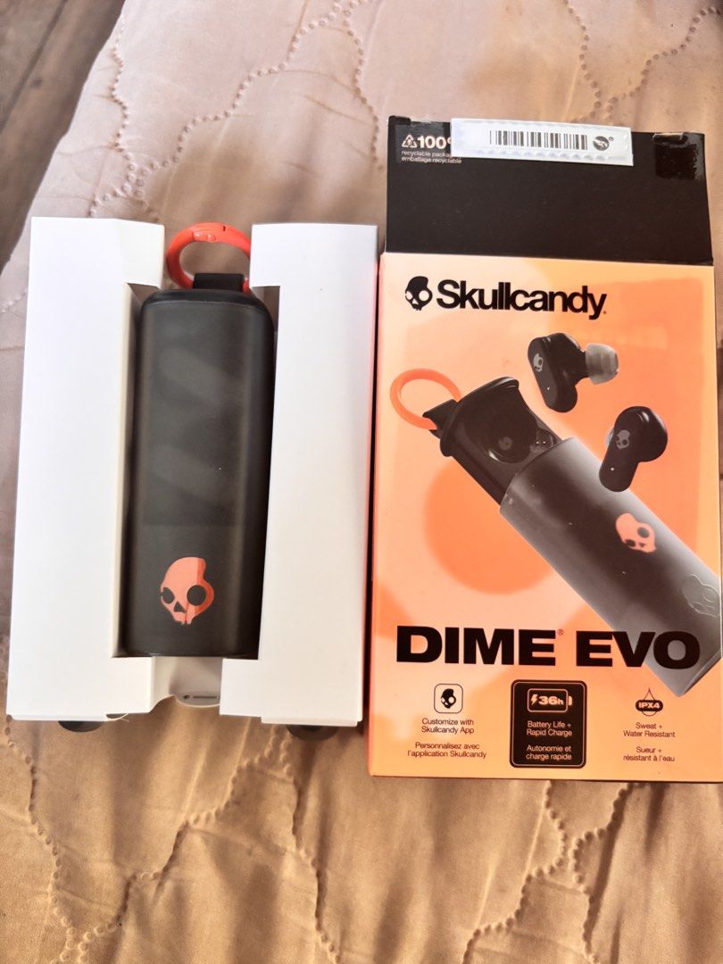 Skullcandy Dime Evo True Wireless Earbuds (Category: Earphones) located in Manila. Submitted by dyonii (Listing ID 1432839687, Image 1). Description: Skullcandy Dime Evo true wireless earbuds - Color: Black with orange skull logo - Used once only - Price is around ₱2.7k, selling for ₱2,000 only.
