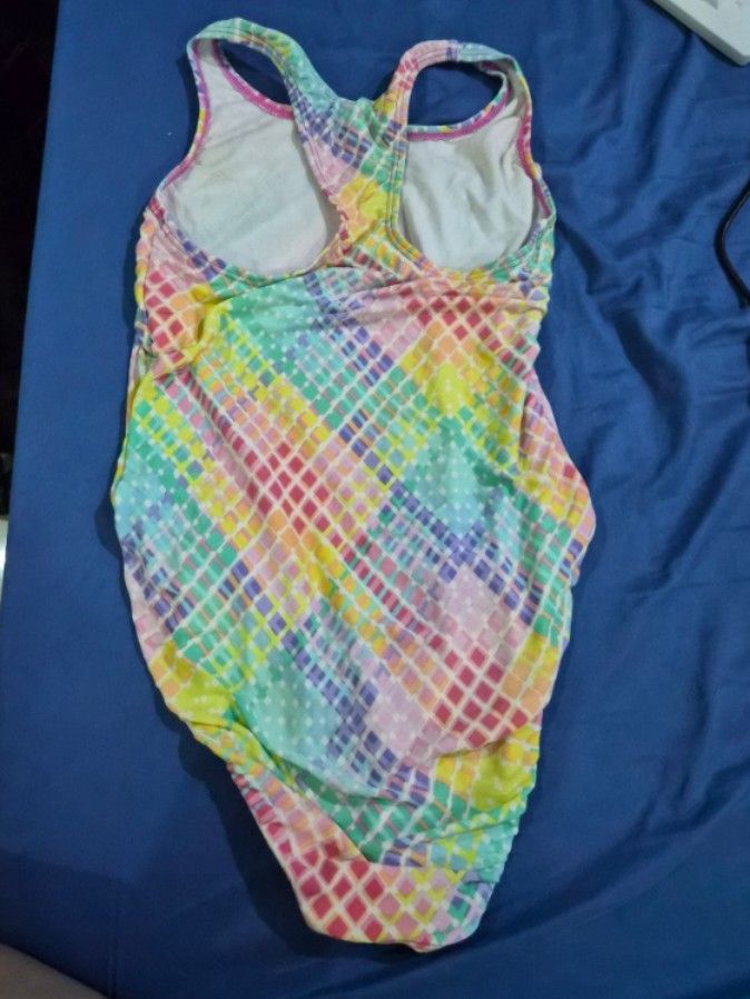 Speedo Swimsuit - Size 10 (Category: Babies & Kids Fashion) located in Las Pinas. Submitted by ktcuartina (Listing ID 1432957137, Image 2). Description: - Speedo swimsuit - Size 10 - Colorful checkered pattern - Scoop back - White lining - Made in Vietnam - Material: 80% nylon, 20% elastane.