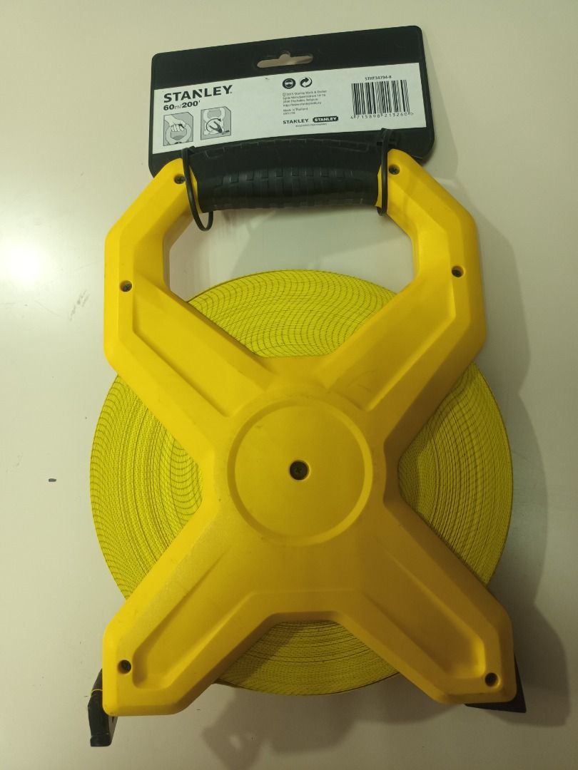 Stanley 60m/200' Open Reel Measuring Tape (Category: Construction Tools & Equipment) located in Manila. Submitted by ipstuff23 (Listing ID 1432842738, Image 2). Description: - Stanley open reel measuring tape - 60 meters / 200 feet length - Durable yellow case with black handle - Clear, easy-to-read markings - Ideal for construction, surveying, and more - New and unused.