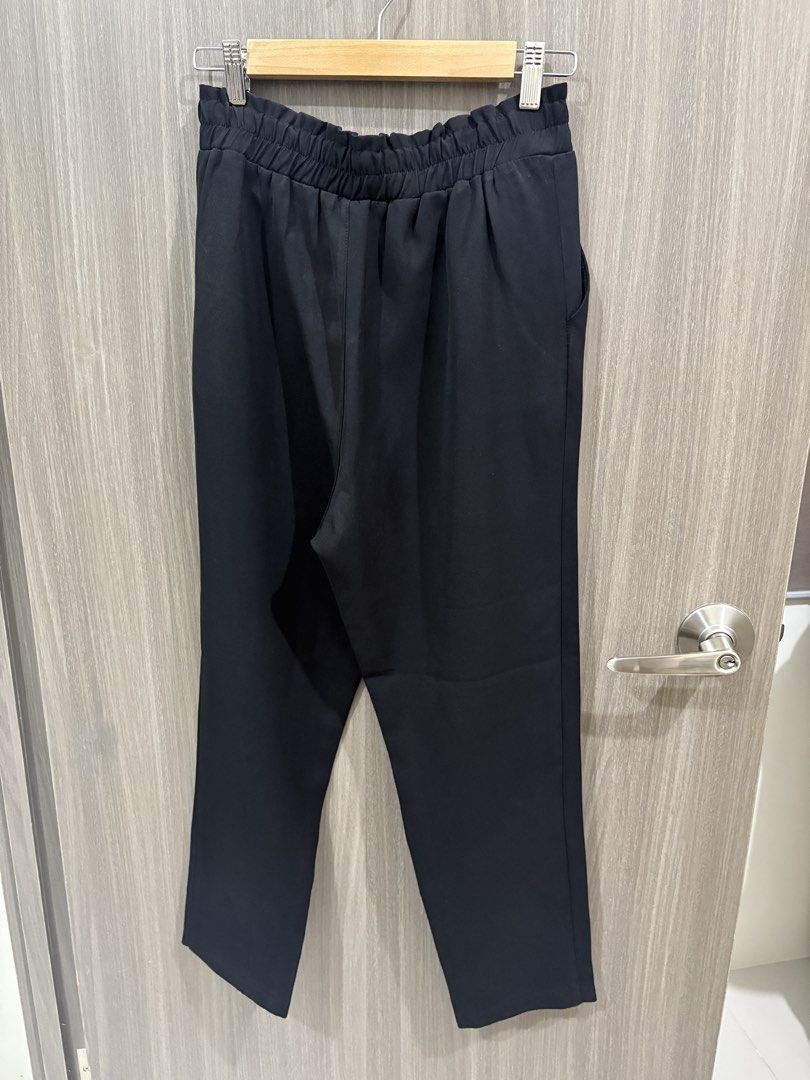 Stradivarius Black Knot Trousers (Category: Other Bottoms) located in Manila. Submitted by dkarchives (Listing ID 1432923265, Image 2). Description: - Stradivarius Black Trousers with Tie - Fit: Loose but a bit narrow fit to the bottom - Stretchable - Buttons at the front are just for design - Material is soft and light! - Very comfy to wear! .