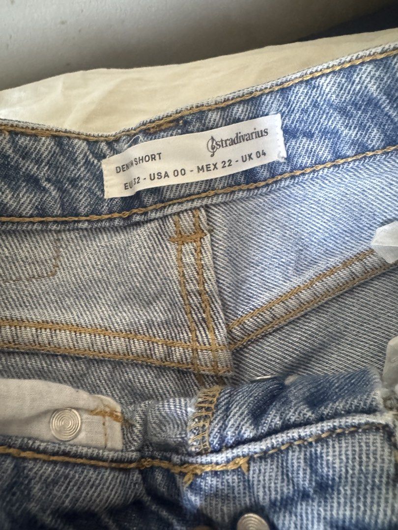 Stradivarius Denim Shorts (Category: Shorts) located in Las Pinas. Submitted by allyash (Listing ID 1432865963, Image 3). Description: - Stradivarius denim shorts - Light blue wash - High-waisted - Button and zipper closure - Front and back pockets - Rolled hem - Size: EU 32, USA 00, MEX 22, UK 04 - doesn’t fit anymore - shipping to be handled by buyer.