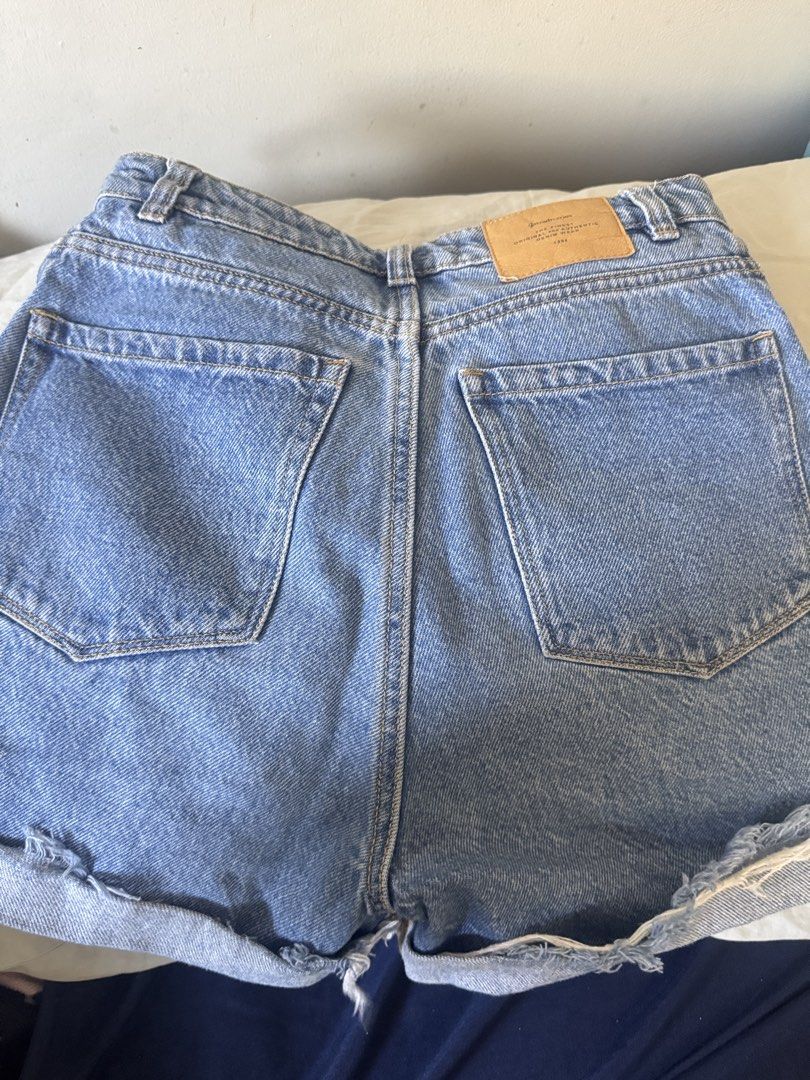 Stradivarius Denim Shorts (Category: Shorts) located in Las Pinas. Submitted by allyash (Listing ID 1432865963, Image 2). Description: - Stradivarius denim shorts - Light blue wash - High-waisted - Button and zipper closure - Front and back pockets - Rolled hem - Size: EU 32, USA 00, MEX 22, UK 04 - doesn’t fit anymore - shipping to be handled by buyer.