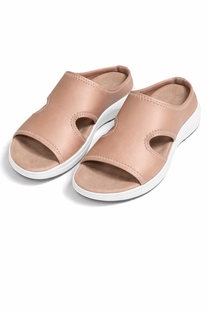Tan Slip-on Sandals with White Sole (Category: Flats & Sandals) located in Antipolo. Submitted by cl026 (Listing ID 1432835222, Image 1). Description: - Tan slip-on sandals - Comfortable design - White sole - Cutout detail on upper - Textured sole for grip - Unworn condition - Perfect for casual wear - Stylish and practical.