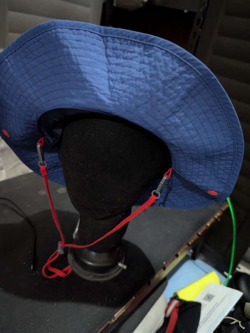 The North Face Reversible Bucket Hat (Category: Caps & Hats) located in Imus. Submitted by kmoort (Listing ID 1432846456, Image 3). Description: - The North Face reversible bucket hat - Vibrant red and blue color scheme - Red exterior with blue brim - Blue interior - Includes a chin strap - Features snap buttons - Embroidered The North Face logo - Made of lightweight, possibly water-resistant material -medium on tag .