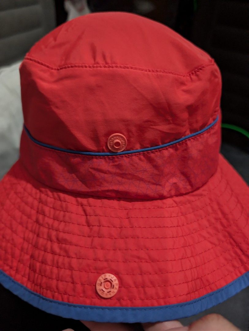 The North Face Reversible Bucket Hat (Category: Caps & Hats) located in Imus. Submitted by kmoort (Listing ID 1432846456, Image 2). Description: - The North Face reversible bucket hat - Vibrant red and blue color scheme - Red exterior with blue brim - Blue interior - Includes a chin strap - Features snap buttons - Embroidered The North Face logo - Made of lightweight, possibly water-resistant material -medium on tag .