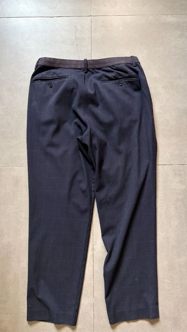 Uniqlo Men Smart Ankle Pants - Dark Navy with Checkered Pattern (subtle) (Category: Trousers) located in Cabuyao City. Submitted by enribiolog03874 (Listing ID 1432858576, Image 2). Description: Uniqlo Smart Ankle Pants for sale! Ganda. Pwedeng ilaban sa smart casual / smart business / casual settings dahil sa color and sa pattern. Cherry-on-top yung subtle na checkered pattern-- especially if ipapares mo with a plain top. It gives your fit a vis