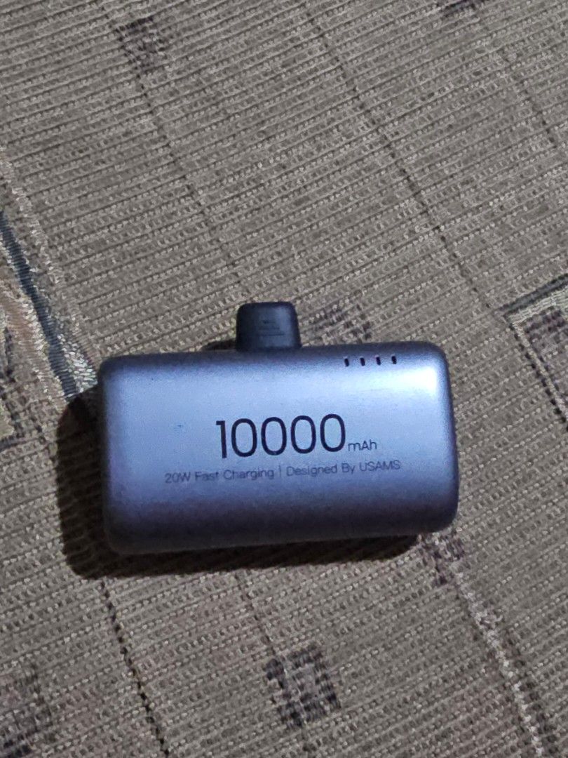 USAMS 10,000 MAH Powerbank (Category: Chargers) located in Marilao. Submitted by ____jnsk (Listing ID 1432922048, Image 1). Description: - USAMS 10,000 mAh Powerbank - Modern and sleek design - Perfect for charging on the go - A reliable power solution.