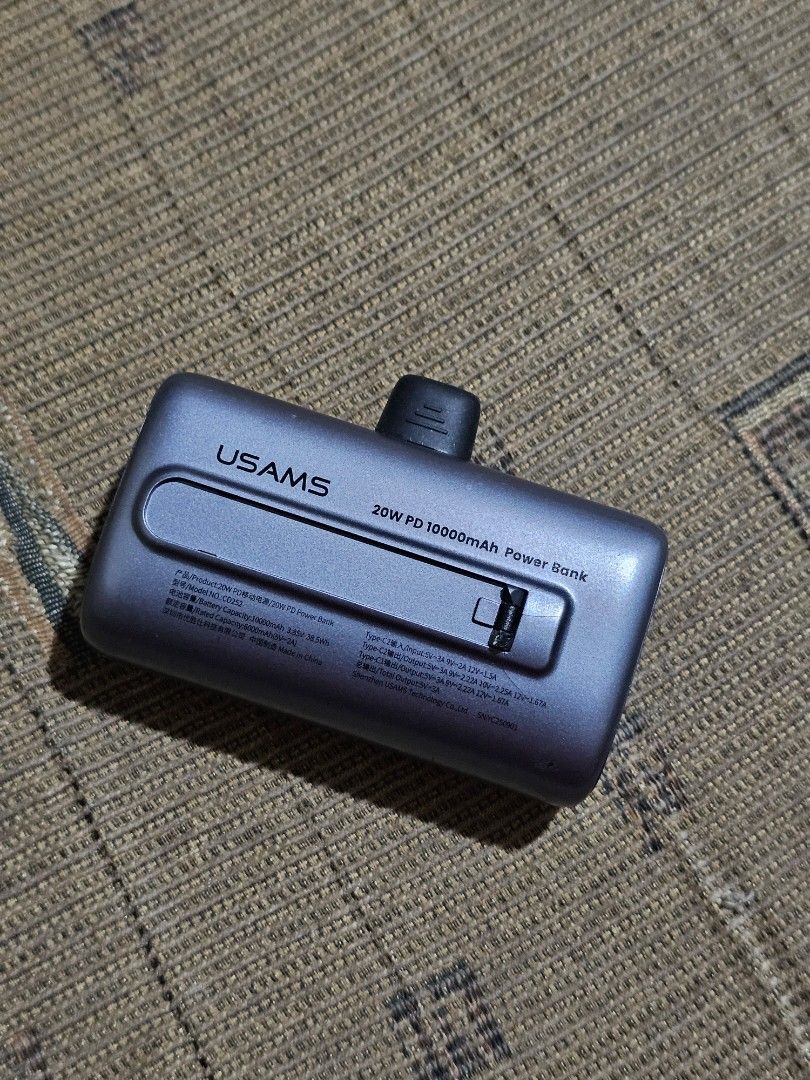 USAMS 10,000 MAH Powerbank (Category: Chargers) located in Marilao. Submitted by ____jnsk (Listing ID 1432922048, Image 2). Description: - USAMS 10,000 mAh Powerbank - Modern and sleek design - Perfect for charging on the go - A reliable power solution.