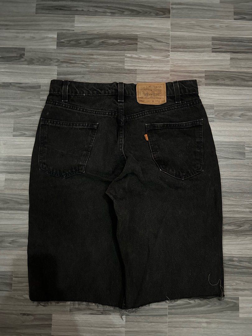 Vibtage Levi's 550 Black Jorts (Category: Jeans) located in Tarlac. Submitted by clydeascope (Listing ID 1432890860, Image 2). Description: - Levi's 550 black jeans - Size: W33 L: 21 - Classic five-pocket design - Zip fly - Levi's logo patch on back - Bottom hem has been cut (cinut into jorts, dating pants) **PLEASE TAKE NOTE** - No returns, refunds, or exchanges. Please purchase at your own risk. - I will provide pictures and a video of the item