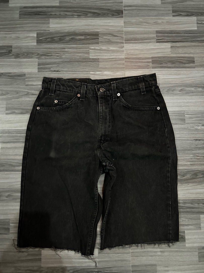 Vibtage Levi's 550 Black Jorts (Category: Jeans) located in Tarlac. Submitted by clydeascope (Listing ID 1432890860, Image 1). Description: - Levi's 550 black jeans - Size: W33 L: 21 - Classic five-pocket design - Zip fly - Levi's logo patch on back - Bottom hem has been cut (cinut into jorts, dating pants) **PLEASE TAKE NOTE** - No returns, refunds, or exchanges. Please purchase at your own risk. - I will provide pictures and a video of the item