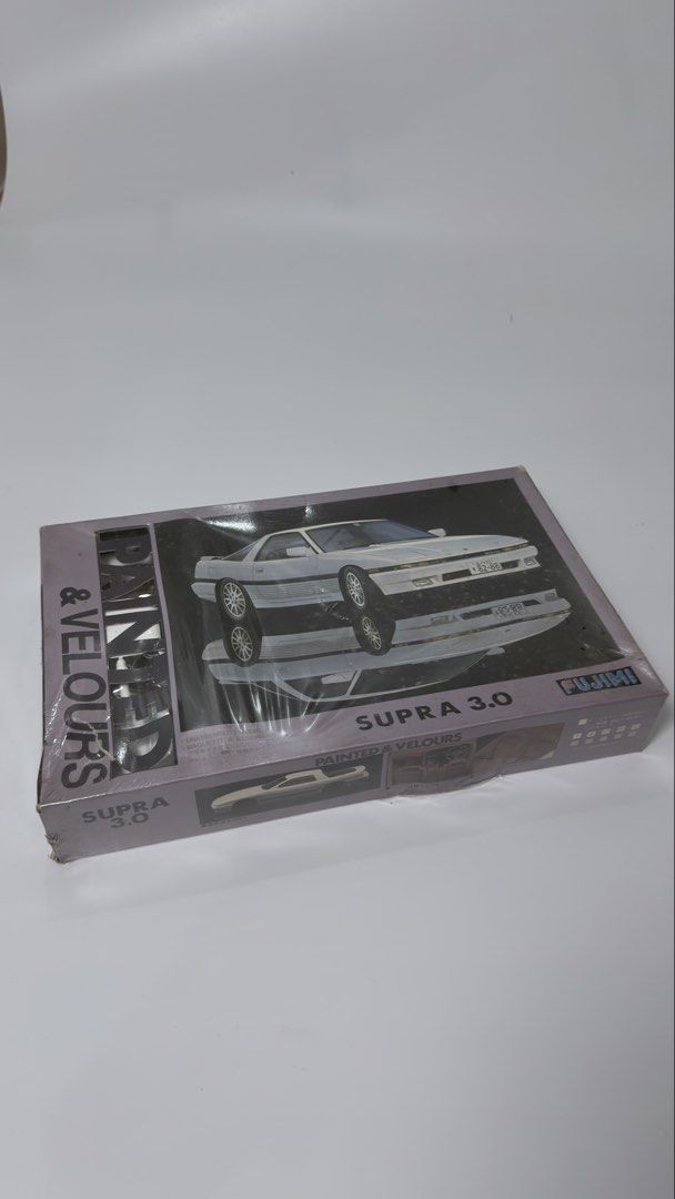 Vintage Fujimi Supra 3.0 Model Kit (Category: Vehicle & Diecast Models) located in Alfonso. Submitted by jbcamet (Listing ID 1432916636, Image 1). Description: Fujimi Supra 3.0 model kit. The box shows the car in white. It is a "Painted & Velours" model. The box is sealed in plastic. The model kit is for the Toyota Supra 3.0..