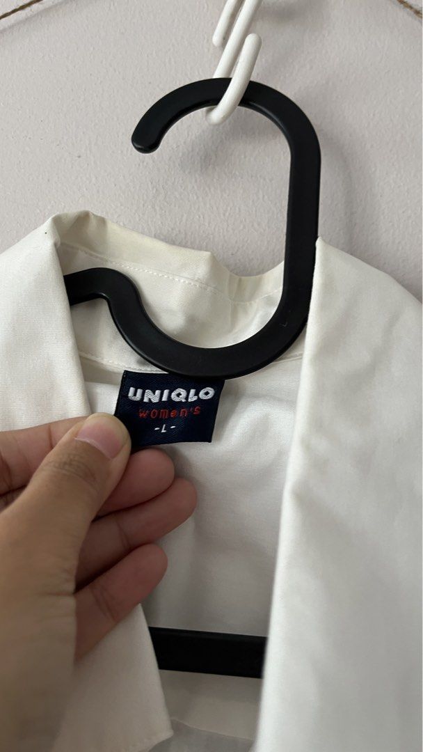Vintage Uniqlo White Polo (Category: Blouses) located in Mandaluyong City. Submitted by jillienlim (Listing ID 1432884588, Image 2). Description: Needs washing!! stored for a long time.. still in great condition!! size: L on tag (can fit M) condition: 100/10 no flaws rfs: decluttering mop: bdo/ gcash.