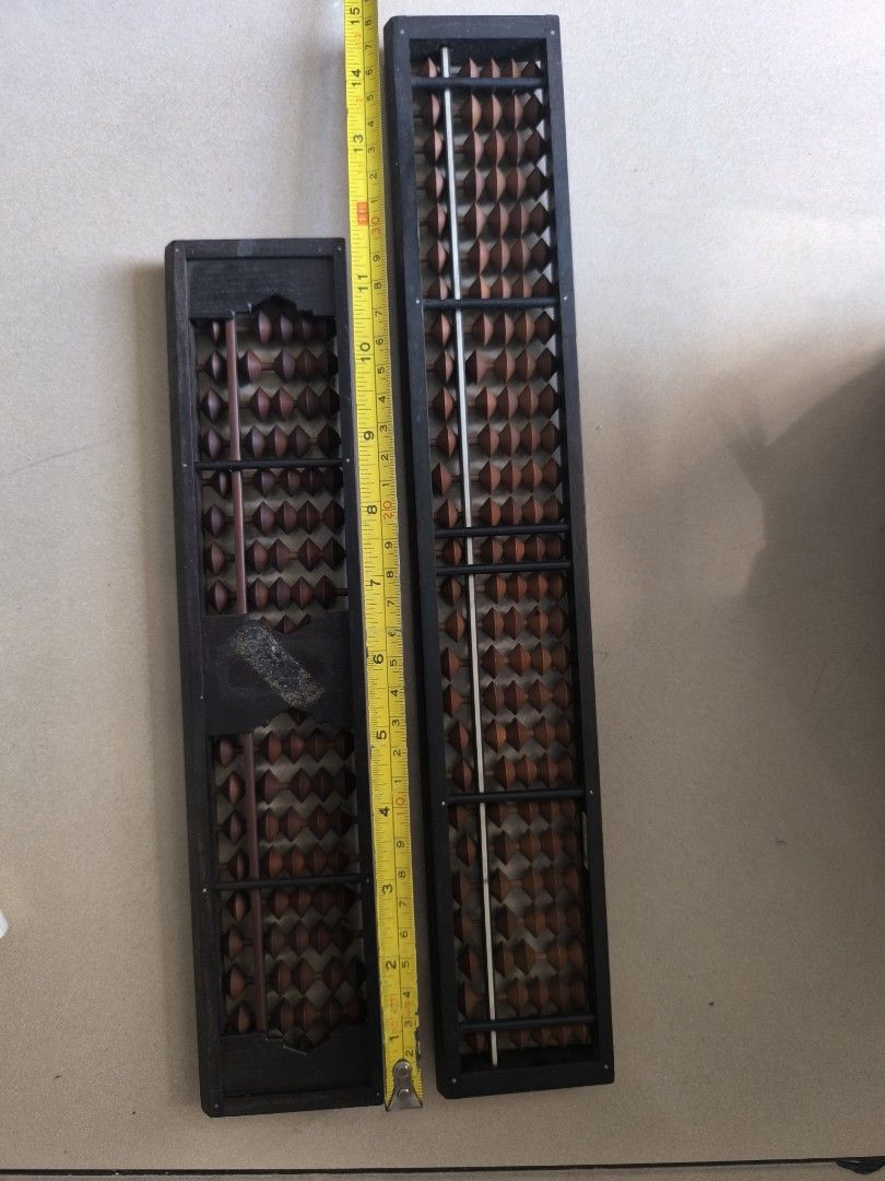 Vintage Wooden Abacus (Category: Vintage Collectibles) located in Manila. Submitted by lianlim.mail (Listing ID 1432799068, Image 2). Description: - Two vintage wooden abacuses from Japan - Sold as set - Features wooden beads and dark wood frames - Beads are intact take all for P550.