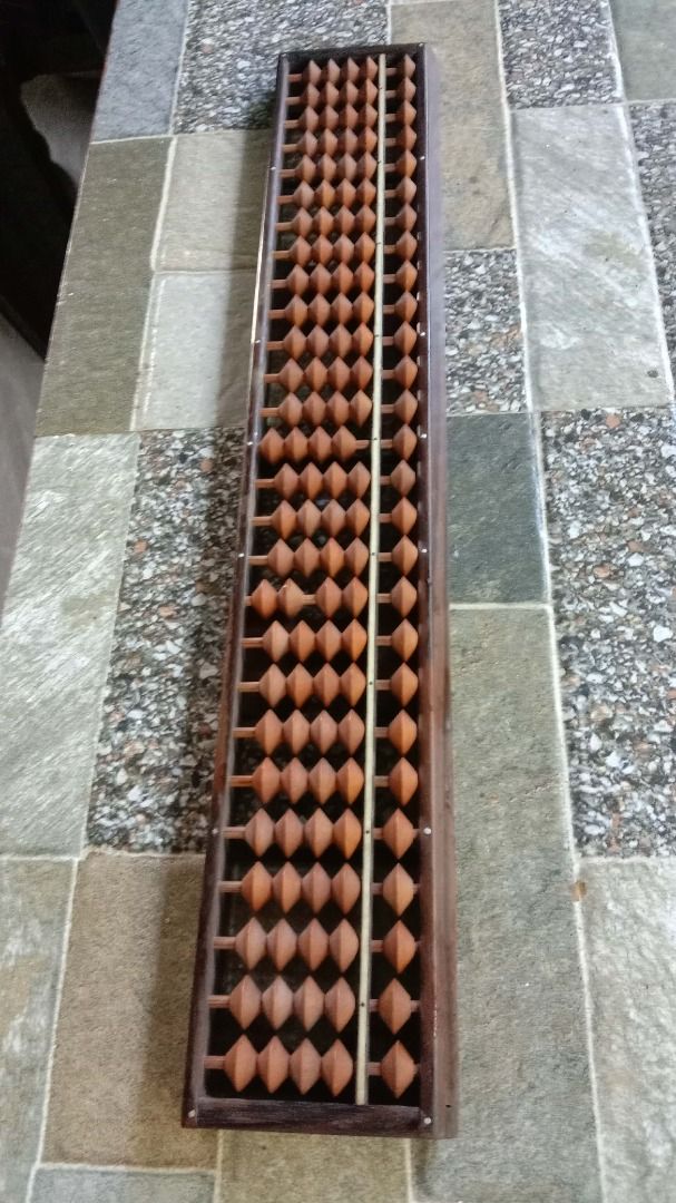 Vintage Wooden Soroban Abacus (27-Column) (Category: Vintage Collectibles) located in Manila. Submitted by balaiheritage.ph (Listing ID 1432814421, Image 1). Description: Selling this beautiful vintage Japanese-style soroban abacus (27 columns) 15 inches long and 7 cm. Solid wood frame and beads. Great for math practice or as an aesthetic display piece. Price: ₱1,800.00 (Negotiable) PM us if interested!.