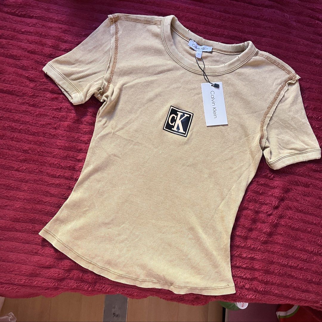 Y2k Acubi Calven Klein Beige Fitted Top (Category: Others Tops) located in Angeles City. Submitted by ownit_ac (Listing ID 1432848276, Image 1). Description: Never worn! Mygosh! This is so pretty! It will hug your body perfectly 🫣🤭 The design and details also gives Acubi vibes 📞🖤 For sizes: XS-M.