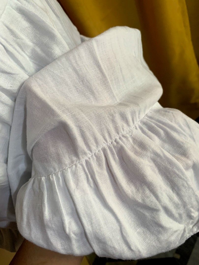ZARA White Tiered Dress (Category: Dresses) located in Bislig. Submitted by styleeee (Listing ID 1432870494, Image 2). Description: - small-medium - White V-neck dress - Features short, puffed sleeves - Flowy tiered skirt - Made of linen fabric.