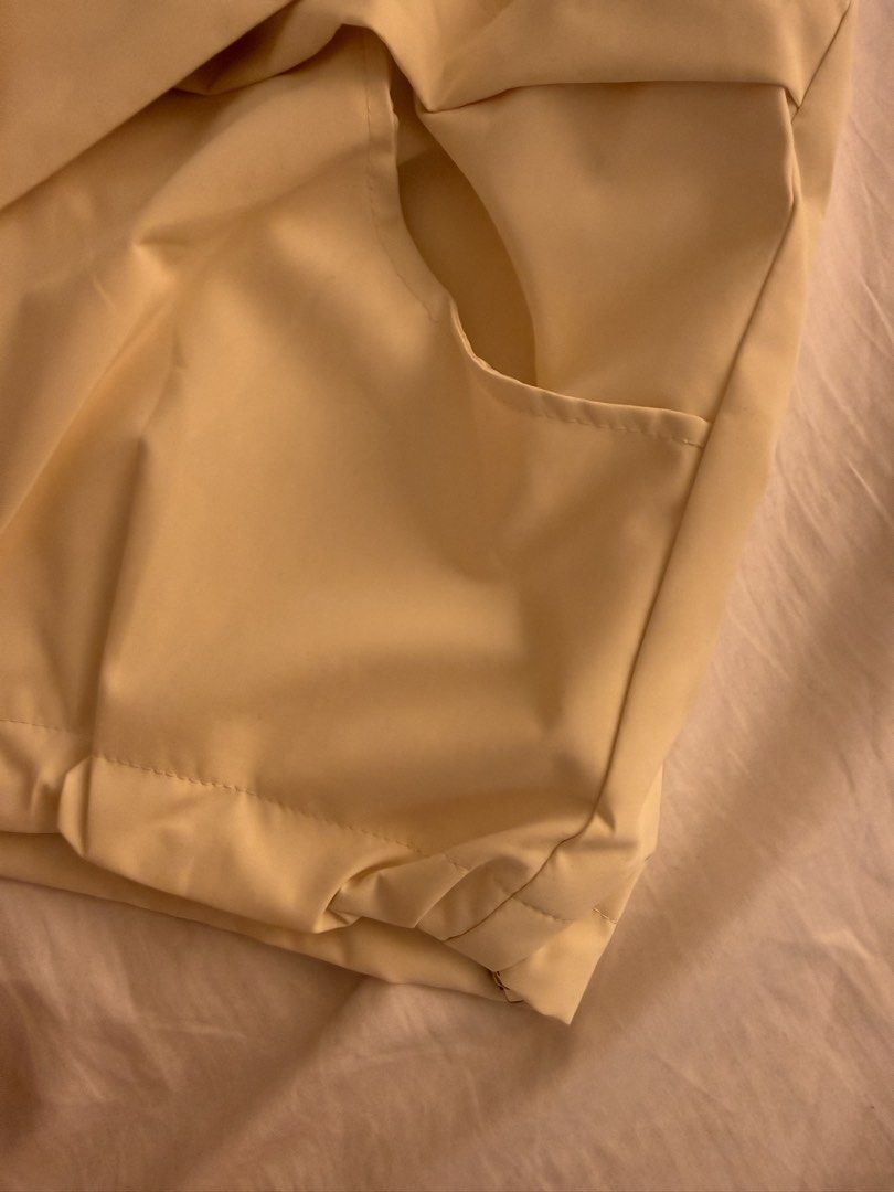 Alo Cream Jacket with Hood (Category: Coats, Jackets and Outerwear) located in Quezon City. Submitted by mochiringo84 (Listing ID 1433037378, Image 3). Description: - Cream-colored Alo jacket - Hooded with zipper closure - Features the Alo logo - Two side pockets - Elastic cuffs on sleeves - Made of lightweight material.