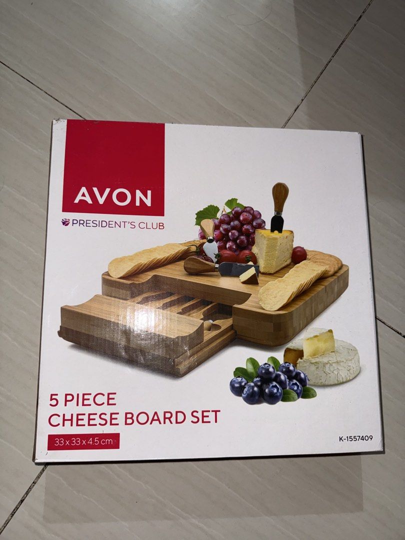 Avon 5 Piece Cheese Board Set (Category: Other Kitchenware & Tableware) located in Marilao. Submitted by ryuryuzj73716 (Listing ID 1433063148, Image 1). Description: - Avon 5-piece cheese board set - Includes wooden cheese board - Features a pull-out drawer - Comes with cheese knives - Box dimensions: 33 x 33 x 4.5 cm - Ideal for serving cheese and snacks.
