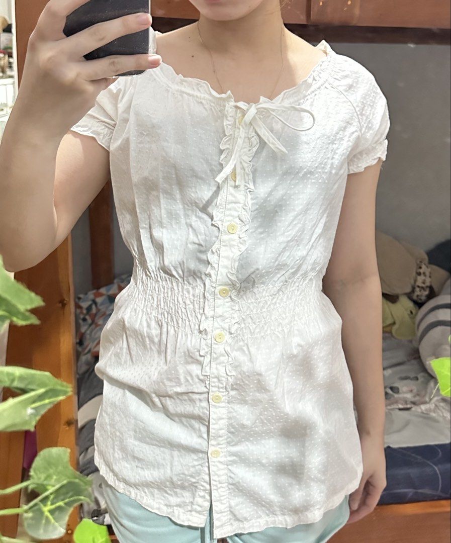 Babydoll Top White Button-Down Blouse with Ruffles (Category: Blouses) located in Batangas. Submitted by daefloress (Listing ID 1433078962, Image 1). Description: Delivery thru j&t loc: san jose batangas fits to: m-l.