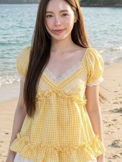 Bangkok Yellow Gingham Top with Lace (Category: Sleeveless) located in Manila. Submitted by inationg (Listing ID 1433117378, Image 1). Description: - Yellow gingham top - Square neckline - Delicate lace trim - Short, puffed sleeves - Ruffled hem - Lightweight fabric - Flattering fit - Ideal for casual outings or the beach.