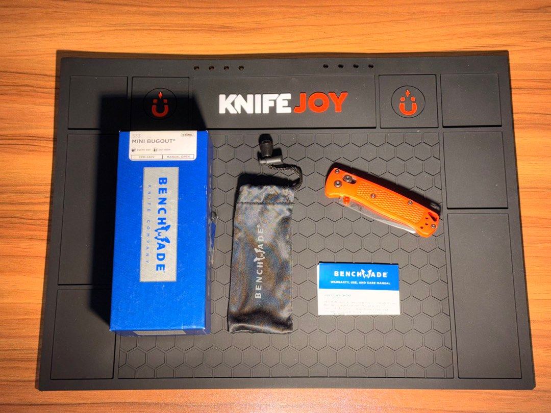 Benchmade Mini Bugout Knife 533 Orange handle (Category: Knives & Chopping Boards) located in Quezon City. Submitted by techfindsmnl (Listing ID 1433197470, Image 3). Description: Benchmade Mini bugout S30v blade Orange - Benchmade Mini Bugout knife - Includes original box, pouch, and paperwork - Orange handle - Pocket clip - Benchmade logo visible.
