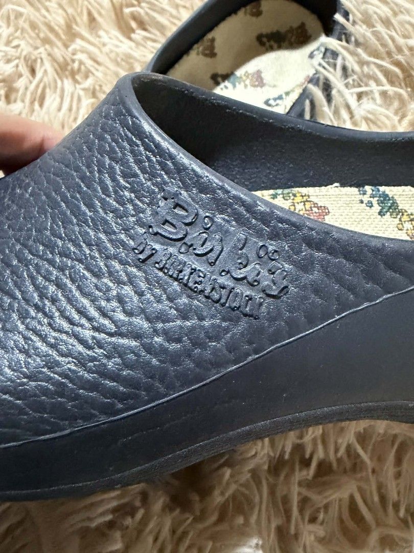 Birki's by Birkenstock Clogs 21cm (Category: Babies & Kids Fashion) located in Pateros City. Submitted by armcandystuff (Listing ID 1433085347, Image 2). Description: - Birki's by Birkenstock clogs - 21cm - Dark blue color - Textured exterior - Slip-on style - Patterned insole - Birki's logo visible.