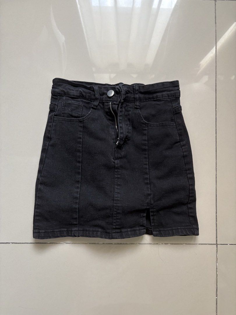 Black Denim Mini Skort (Category: Skirts) located in Quezon City. Submitted by issa1221 (Listing ID 1433097597, Image 1). Description: - Black denim mini skort - Front zipper closure - Front pockets - Small front hem slit - Classic five-pocket design - Fitted silhouette - Perfect for casual wear.