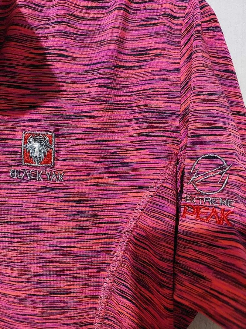 Black Yak Extreme Peak Zip-Up Top (Category: Activewear) located in Quezon City. Submitted by MA_finds014 (Listing ID 1433101593, Image 2). Description: - Pink and black patterned zip-up top - Half-zip closure with orange zipper - Black Yak logo on left chest - Extreme Peak logo on right sleeve - Short sleeves - High collar.