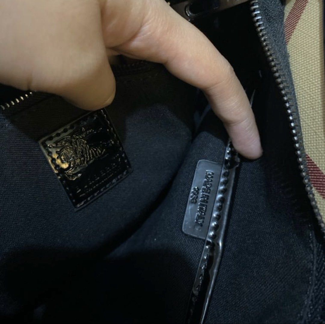 Blueberry Pochette (Category: Luxury Bags & Wallets) located in Iloilo. Submitted by yellowfinz (Listing ID 1433098226, Image 2). Description: Burberry pochette -replaced straps -with flaws -NGA -still very cute in person!.