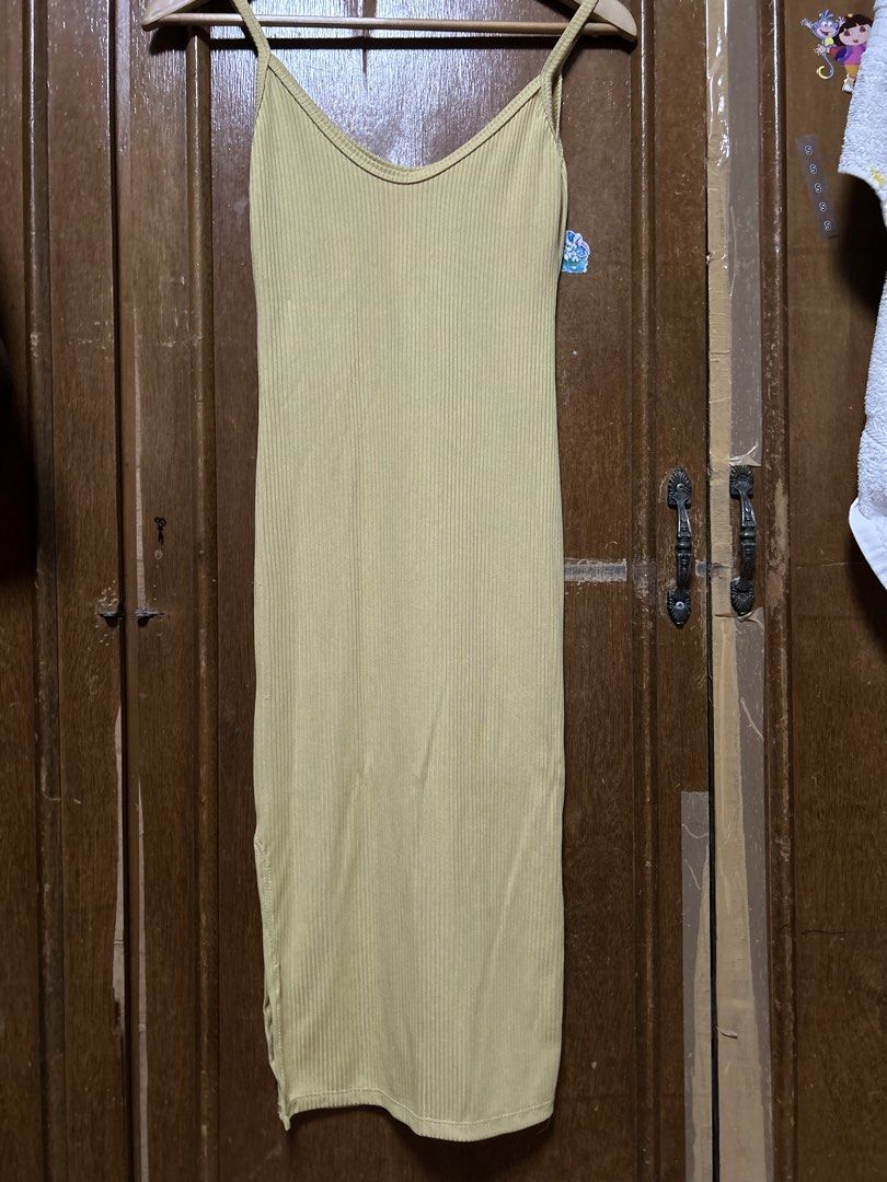 Bodycon sleeveless dress (Category: Dresses) located in Manila. Submitted by gynnelle (Listing ID 1433137392, Image 2). Description: Bodycon Sleeveless Dress with Slit (Yellow) Casual Stretcheable Knitted Dress Can fit to XS-M Mode of Delivery: Jnt or lalamove Mode of payment: Gcash only☺️ .