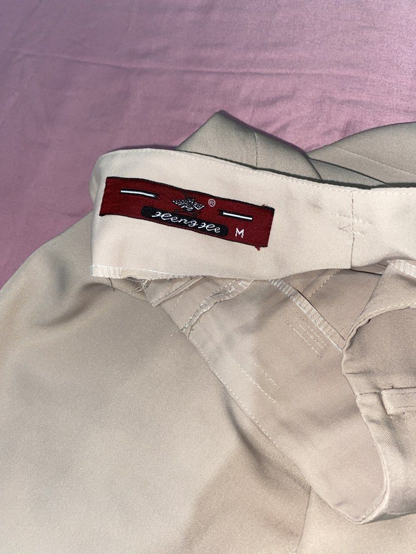 Brown formal slacks (Category: Other Bottoms) located in Lipa City. Submitted by kthh_ (Listing ID 1433065840, Image 3). Description: - Brown formal slacks - Size M (waist: 26-27) - Suitable for work or formal events Loc: Lipa, Batangas MOP: Bank transfer/Gcash.