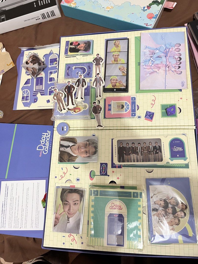 BTS 8th Anniversary D-Day Calendar (Category: K-Wave Merchandise) located in San Ildefonso. Submitted by happybev23 (Listing ID 1433038546, Image 2). Description: - BTS 8th Anniversary D-Day Box - unsealed, only missing JK standee (bitten by my dog 😅) and JK 4cuts (gave to my JK bias friend ☺️).