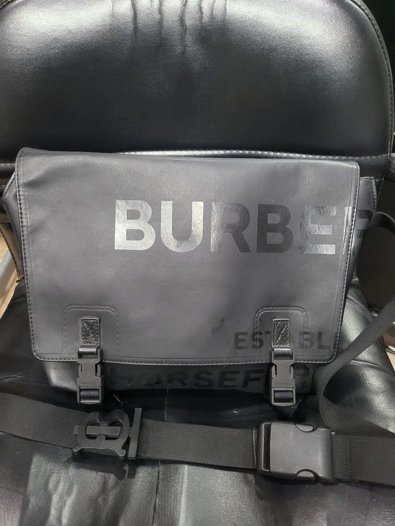 Burberry Crossbody Bag (Category: Luxury Bags & Wallets) located in Manila. Submitted by milkymitch23 (Listing ID 1433028252, Image 1). Description: - Burberry crossbody bag - Black color - Main compartment with zipper - Interior pocket - Front flap with buckle closure - Adjustable shoulder strap with Burberry logo buckle - Made in Italy - pm sa issue.