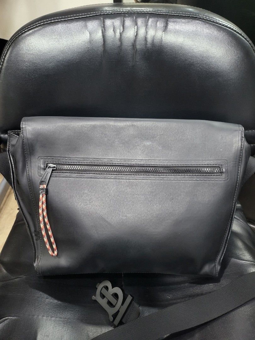 Burberry Crossbody Bag (Category: Luxury Bags & Wallets) located in Manila. Submitted by milkymitch23 (Listing ID 1433028252, Image 2). Description: - Burberry crossbody bag - Black color - Main compartment with zipper - Interior pocket - Front flap with buckle closure - Adjustable shoulder strap with Burberry logo buckle - Made in Italy - pm sa issue.