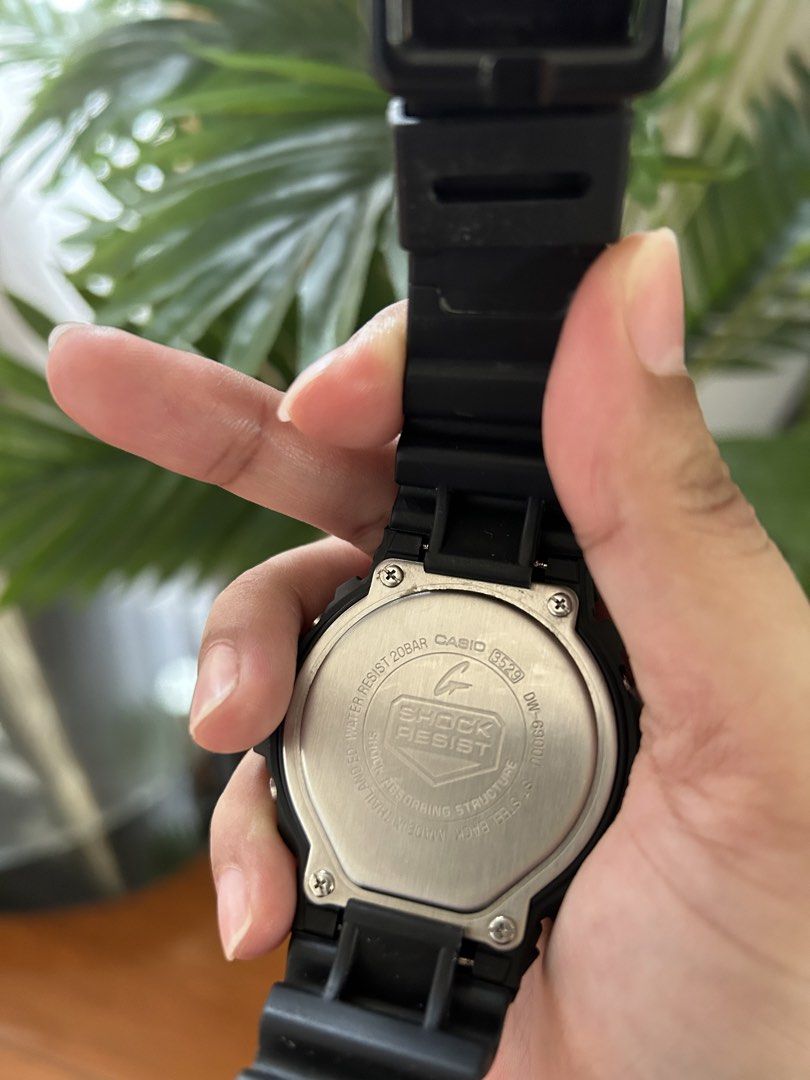 Casio G-Shock DW-6900 (Category: Men's Watches) located in Labrador. Submitted by kharen_1988 (Listing ID 1433060425, Image 2). Description: Casio G-Shock DW-6900 watch in black. Digital display, black resin strap, and red/black bezel. Water resistant to 200M. Features mode, adjust, start/stop, and split/reset buttons..