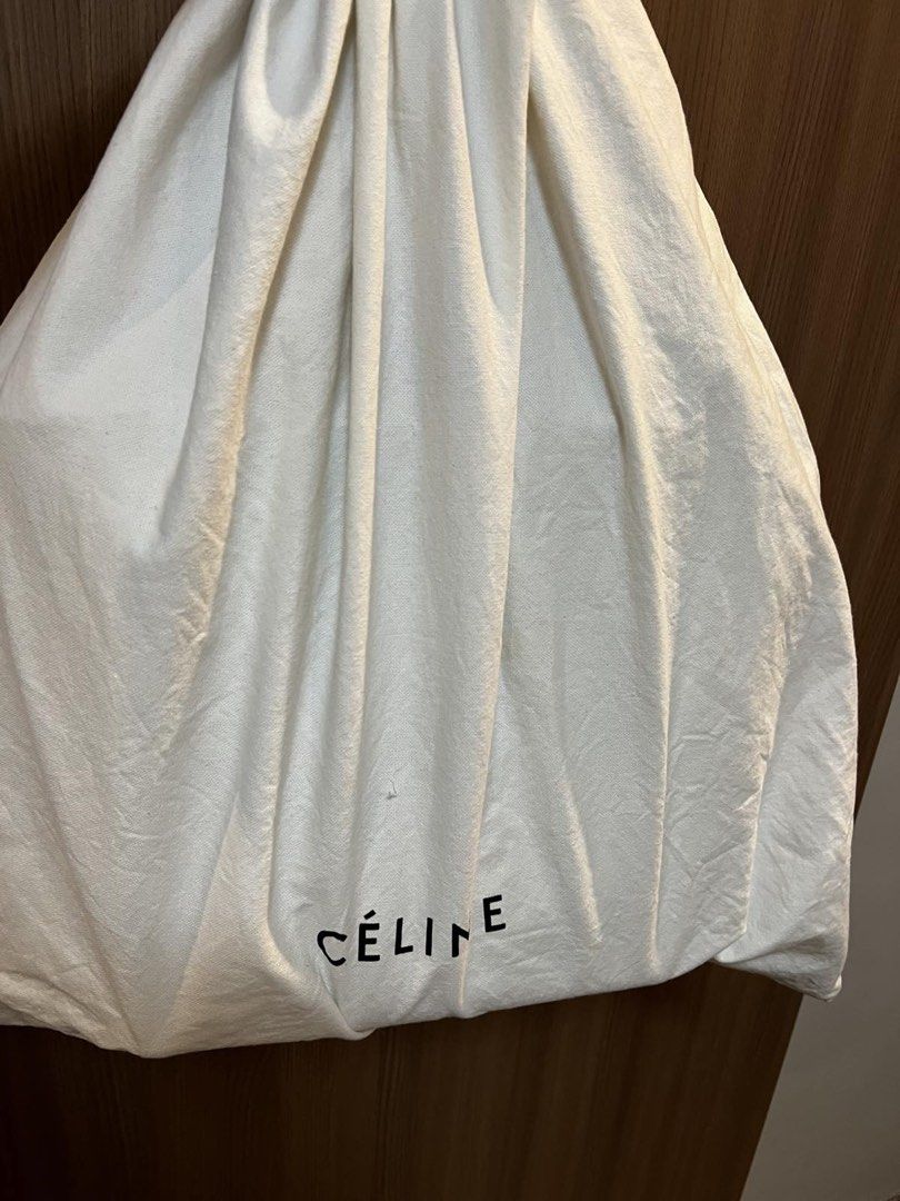 Celine Cabas Phantom Tote Bag (Category: Luxury Bags & Wallets) located in San Juan City. Submitted by pinkbelle14 (Listing ID 1433012876, Image 2). Description: - Authentic Celine Cabas Phantom tote bag - Neutral beige color - Spacious interior - Sturdy handles - Includes dust bag - Minimalist design with Celine logo - Made in Italy bought in 2nd hand shop in Tokyo.