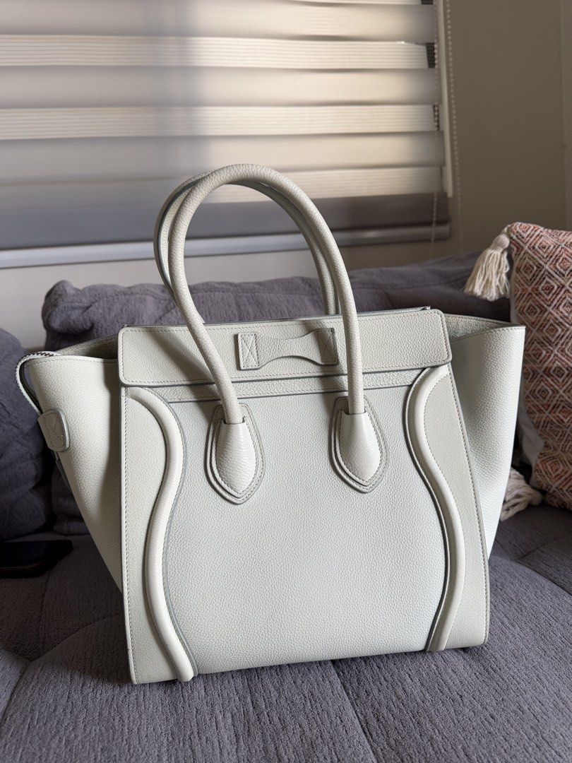 Celine Micro Luggage Tote (Category: Luxury Bags & Wallets) located in General Trias. Submitted by kimlagmanyala (Listing ID 1433146142, Image 2). Description: Celine Micro Luggage Tote in Drummed calfskin leather, color is light mint green In excellent condition with minor signs of usage, includes dustbag.