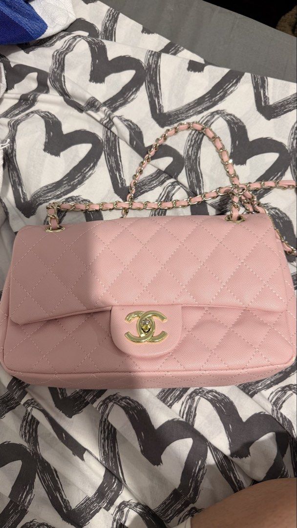 Chanel Pink Quilted Shoulder Bag (Category: Luxury Bags & Wallets) located in Quezon City. Submitted by maycee_vintage (Listing ID 1433056649, Image 1). Description: NGA - Pink quilted shoulder bag - Gold-tone hardware - Chain strap - Flap closure with Chanel logo - Interior zippered pocket and compartments - Diamond-stitched pattern .