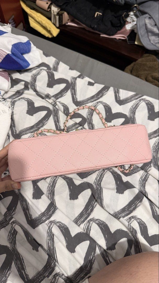 Chanel Pink Quilted Shoulder Bag (Category: Luxury Bags & Wallets) located in Quezon City. Submitted by maycee_vintage (Listing ID 1433056649, Image 2). Description: NGA - Pink quilted shoulder bag - Gold-tone hardware - Chain strap - Flap closure with Chanel logo - Interior zippered pocket and compartments - Diamond-stitched pattern .