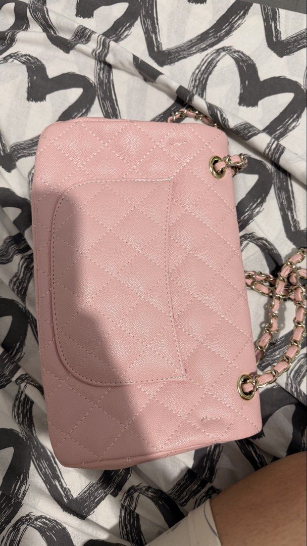 Chanel Pink Quilted Shoulder Bag (Category: Luxury Bags & Wallets) located in Quezon City. Submitted by maycee_vintage (Listing ID 1433056649, Image 3). Description: NGA - Pink quilted shoulder bag - Gold-tone hardware - Chain strap - Flap closure with Chanel logo - Interior zippered pocket and compartments - Diamond-stitched pattern .