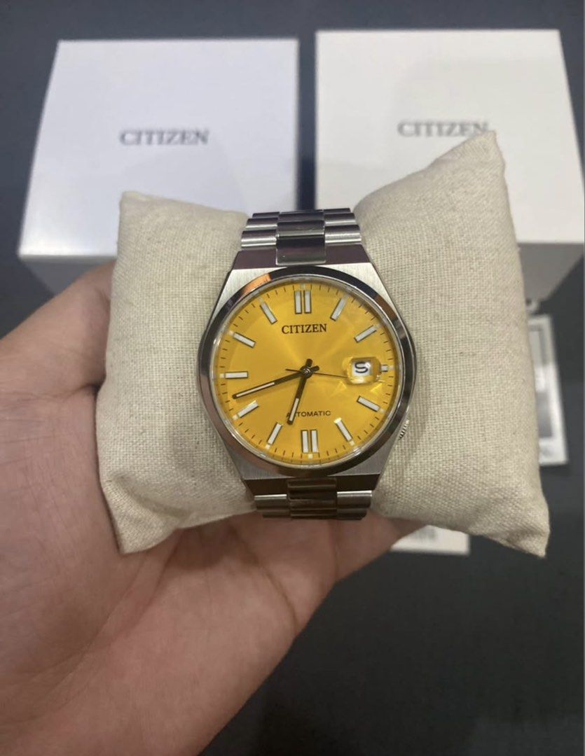 Citizen Tsuyosa Automatic Watch NJ0150-81Z (Category: Luxury Watches) located in Manila. Submitted by johnpaulc41844 (Listing ID 1433010272, Image 1). Description: - Citizen automatic watch - Striking yellow dial - Stainless steel bracelet and case - Includes original box - International guarantee included - Extra links provided - Date display at 3 o'clock - See-through case back - Model number: NJ0150-81Z 9.7/10 condition Loc: Marikina City.