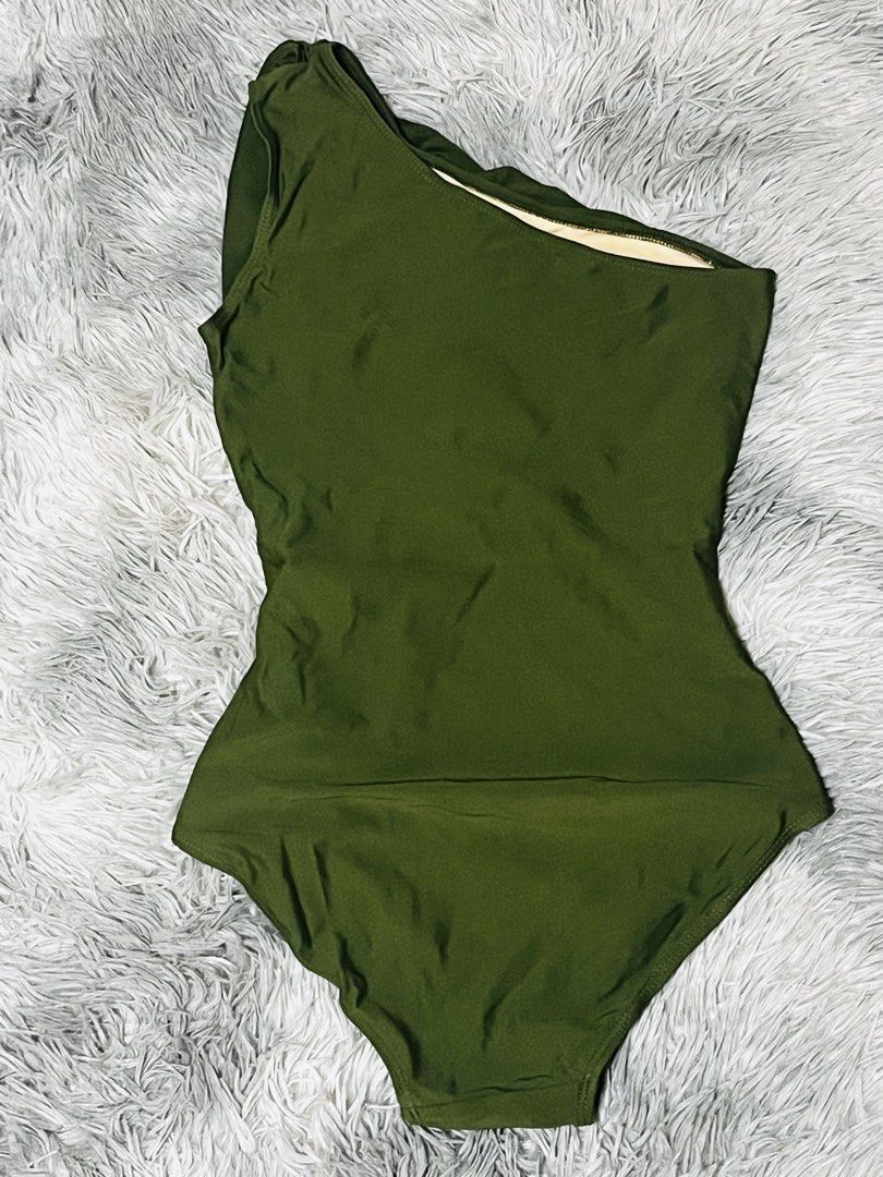 Conservative Olive Green One-Shoulder Swimsuit - Size L (Category: Bikinis & Swimsuits) located in Roxas. Submitted by lacerna_wears (Listing ID 1433024658, Image 2). Description: - Olive green one-shoulder swimsuit - Size: L - Design: One-piece - Features: Ruched bust and side details - Material: Smooth fabric - Condition: Good.