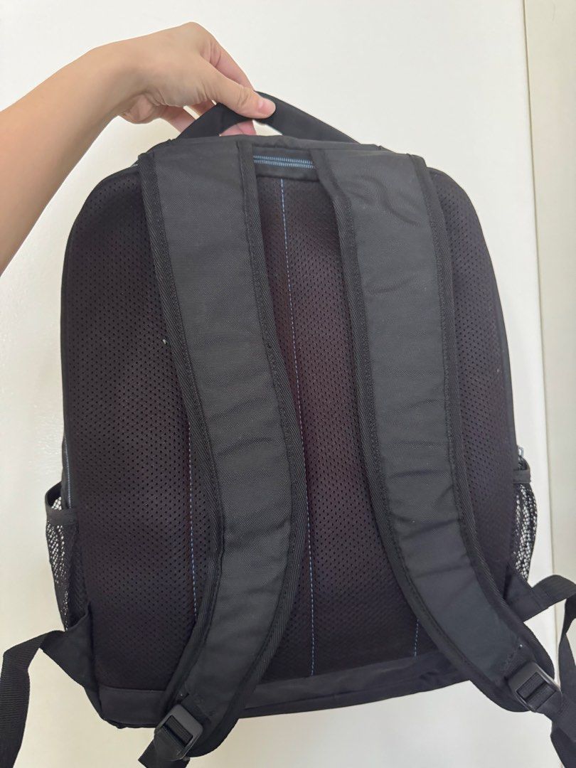 Dell Backpack (Category: Backpacks) located in Pasig City. Submitted by regden (Listing ID 1433039946, Image 2). Description: - Black Dell backpack with laptop slot - Geometric pattern - Top handle and adjustable shoulder straps - Side mesh pockets - Zippered main compartment and front pocket - Breathable mesh back panel - Ideal for everyday use.