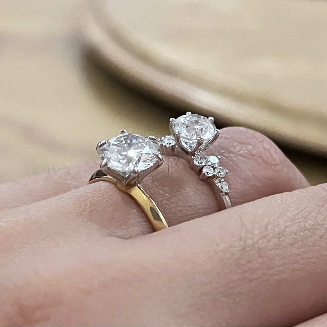 Diamond Engagement ring 18k gold lab grown (Category: Rings) located in Del Monte. Submitted by bellamente (Listing ID 1433107422, Image 2). Description: 1carat center diamond with side stones 1.26cts total 18k White Gold Setting w/ factory certificate Size 6.5 rare half size Php 40,000.00 only 2ct lab grown diamond solitaire Tiffany & Co solitaire setting 18k white gold prongs 18k yellow gold band Size 6 IGI Certificate Php 98,500.00 only.