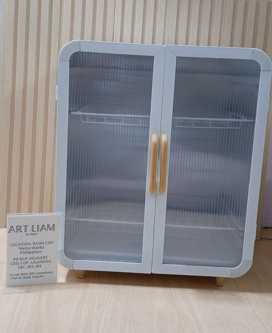 Dish rack plate organizer cabinet ASSEMBLED (Category: Shelves, Cabinets & Racks) located in Pasig City. Submitted by artliam888 (Listing ID 1433104364, Image 1). Description: Dish rack plate organizer cabinet . - Stylish white cabinet - Two clear plastic doors - All white interior - Two white wire shelves - Wooden handles and legs . BRANDNEW never been used Already assembled. . PRICE: 1,695 pesos only . ✅ SAME DAY DELIVERY LALAMOVE ✅ PAY NOW GET