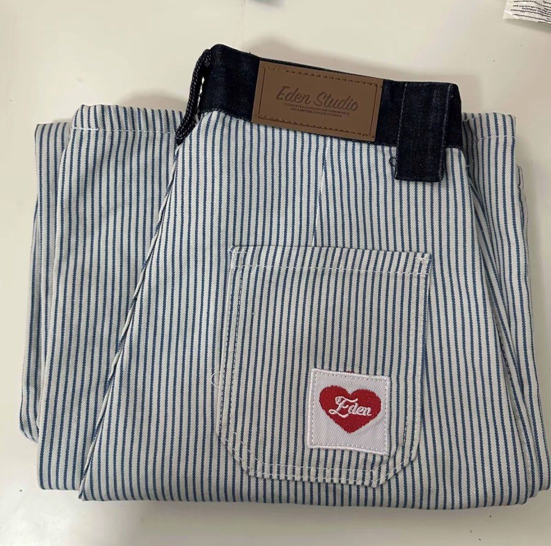 Eden Studio Striped Wide Leg Trousers (Category: Other Bottoms) located in Manila. Submitted by everything.haven (Listing ID 1433031510, Image 2). Description: - Eden Studio striped wide-leg trousers - Features denim waistband - Small heart logo on back pocket - Relaxed fit, mid waist - waist size 28 - Please refer to size chart in images for measurements.