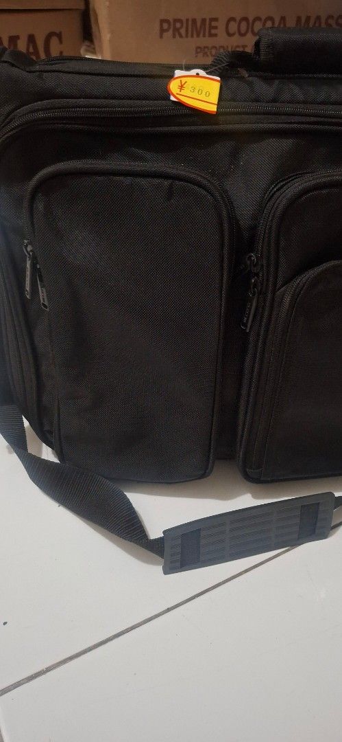 Elecom Laptop Bag Shock Proof Japan (Category: Laptop Bags & Sleeves) located in Manila. Submitted by youngcloud_b1fffa (Listing ID 1433190862, Image 2). Description: - Black Elecom laptop bag - Durable construction - Multiple compartments for organization - Includes shoulder strap and handle - Exterior and interior pockets for storage - Branded Elecom zippers "R&B Mix Japan Surplus Items".