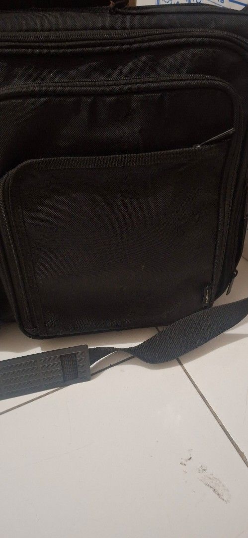 Elecom Laptop Bag Shock Proof Japan (Category: Laptop Bags & Sleeves) located in Manila. Submitted by youngcloud_b1fffa (Listing ID 1433190862, Image 3). Description: - Black Elecom laptop bag - Durable construction - Multiple compartments for organization - Includes shoulder strap and handle - Exterior and interior pockets for storage - Branded Elecom zippers "R&B Mix Japan Surplus Items".